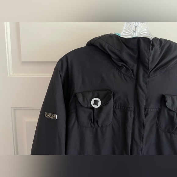 686 Mannual Women’s Insulated Snowboarding Jacket in Black - Picture 8 of 12